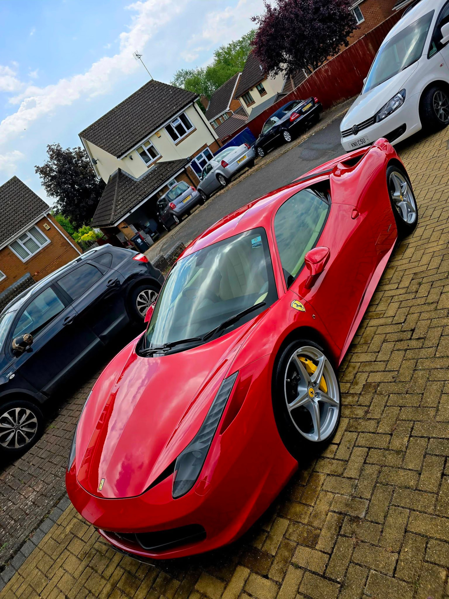Red Ferrari 458 detailed on a driveway by P.P Power Detailing